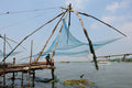 Selecting a 60m Net Buoy Anchor Combo for fishing nets with blue netting and wooden structure.