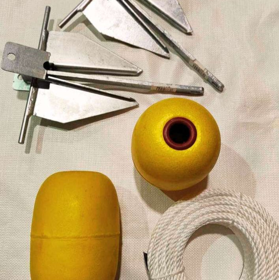 60m Net Buoy Anchor Combo with yellow buoy, Danforth anchor, and rope laid out on a surface.