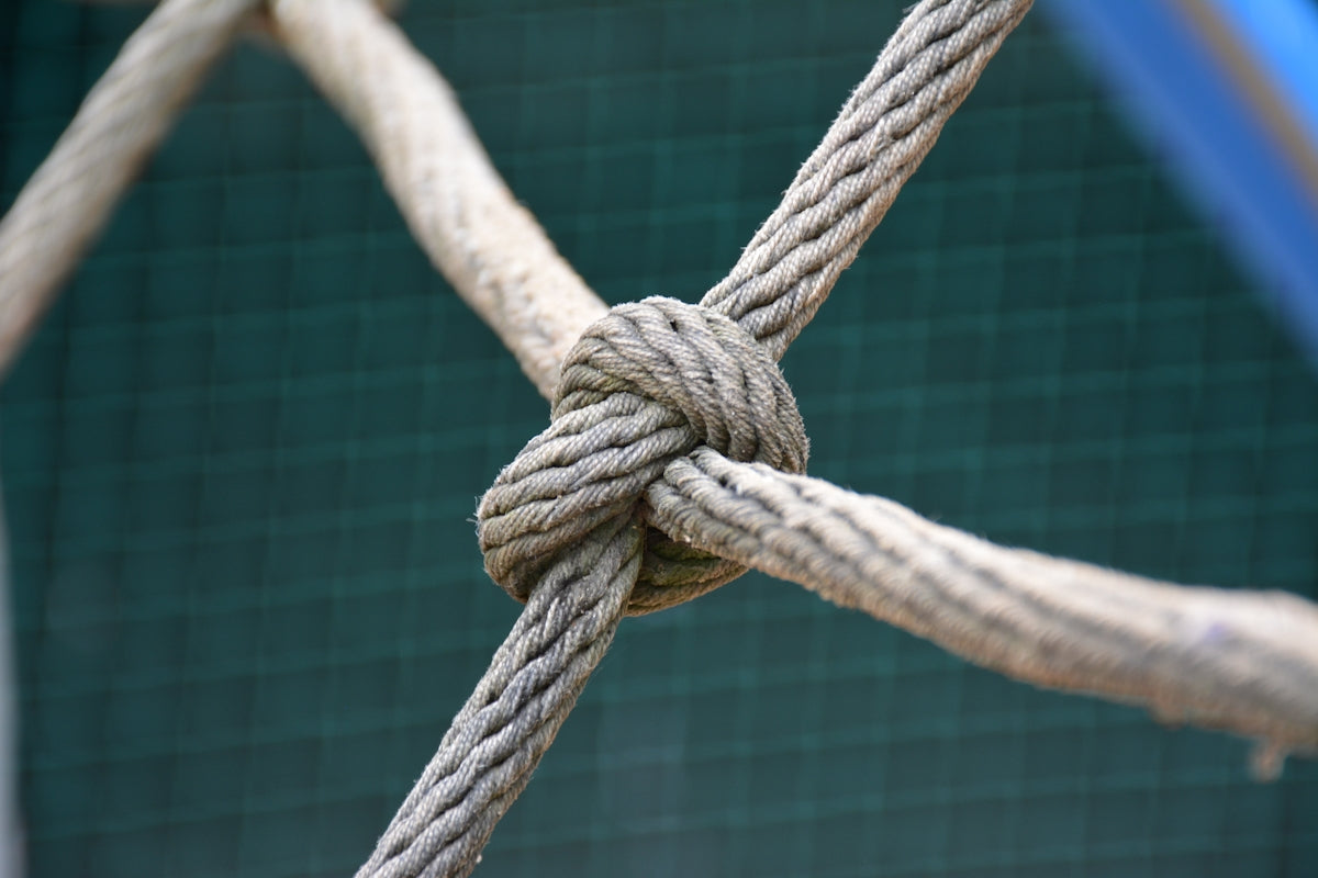 A close-up of a knot in a Softline Control Rope, showcasing its strength for various activities.