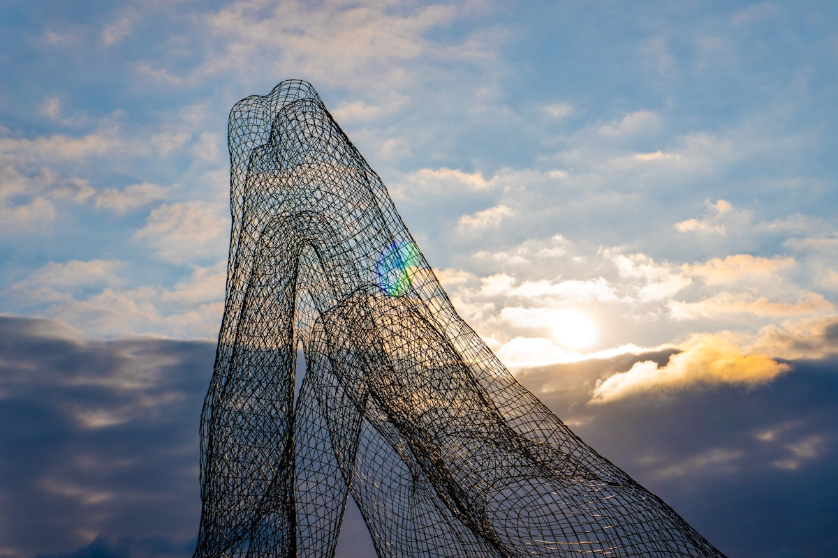 Recreational Mullet Fishing Net caught against a beautiful sunset sky.