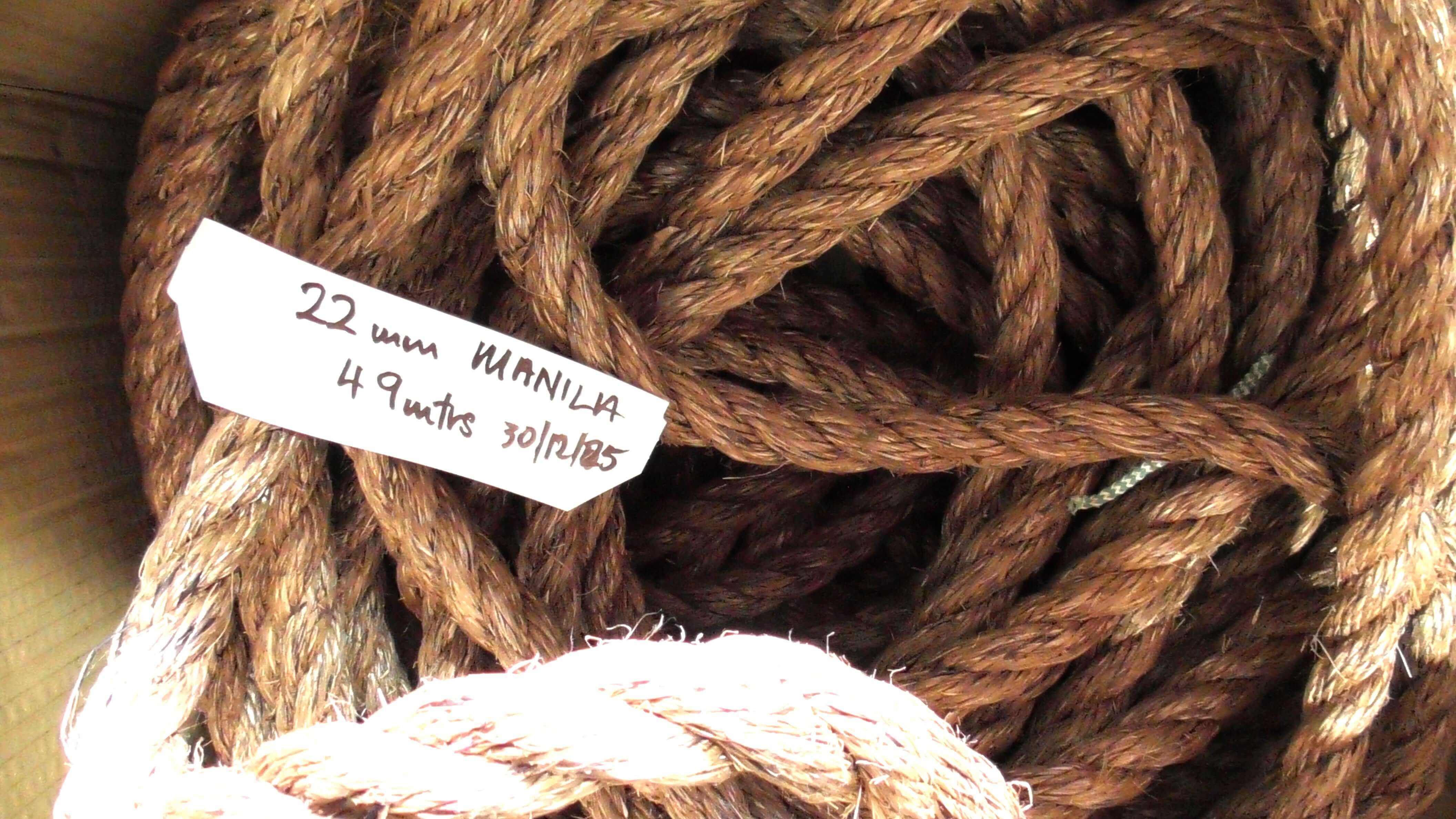 Manila Rope Shorts 22mm x 49 meters coiled with a label showing dimensions and length.