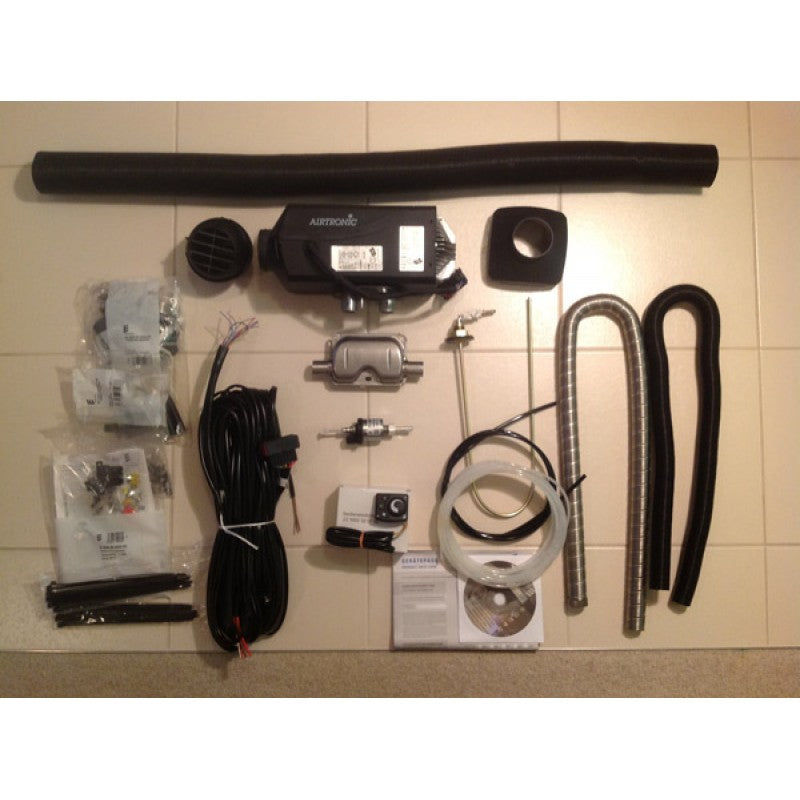 Motor Home RV Heater Eberspacher Airtronic D4 installation kit including heater unit, hoses, and accessories.