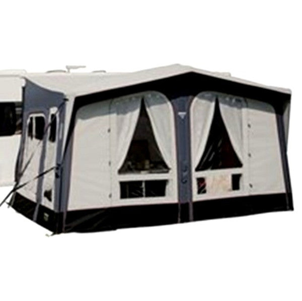 Vango Riviera 390 Awning Elements Pro Shield set up on a caravan, offering a spacious outdoor living area.