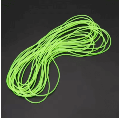 Luminous Green Tube 1.5mm x 39m laying on a dark background, showcasing its vibrant color and flexible design.