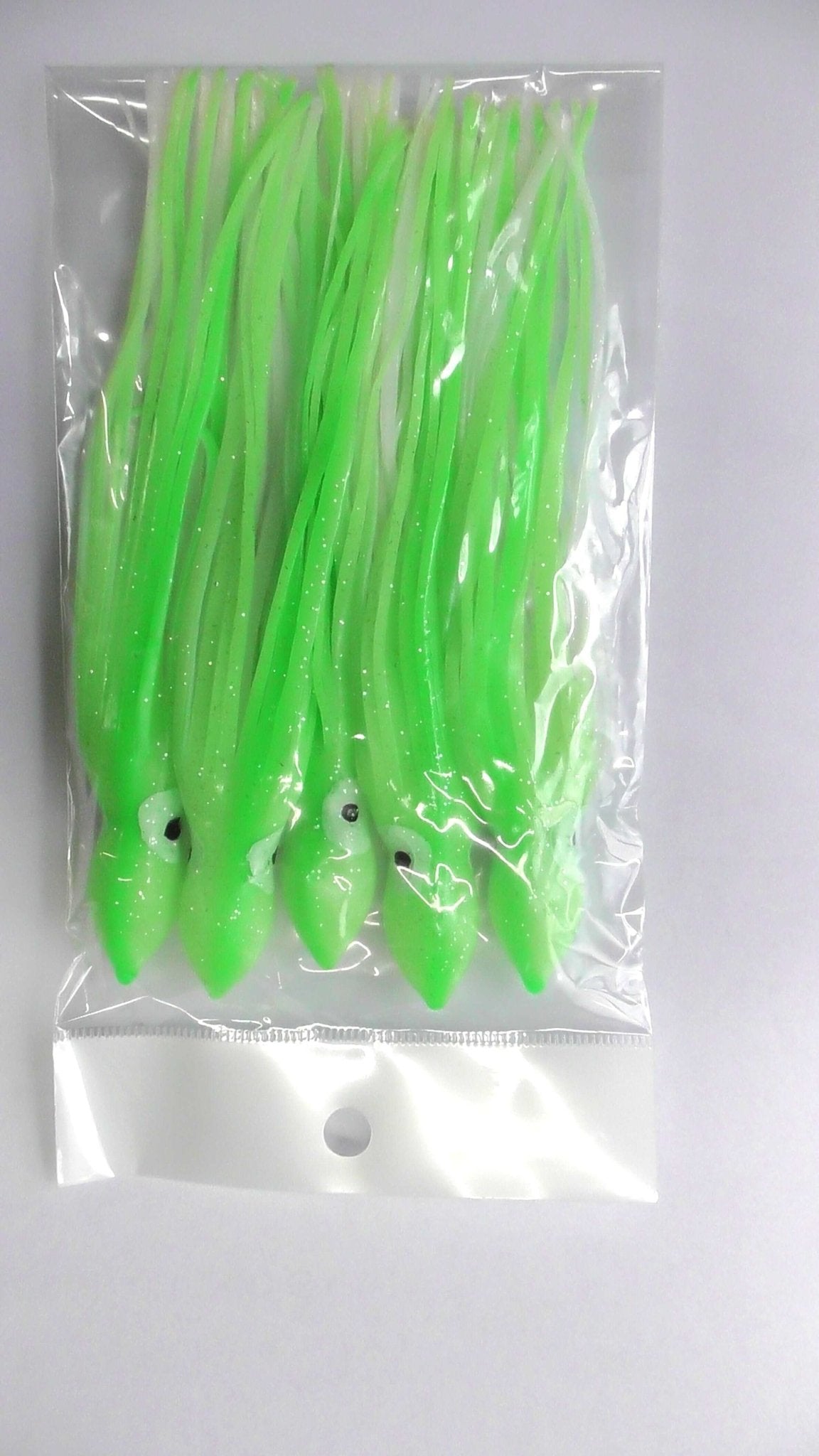 Luminous Octopus Skirt Glow Soft Lure 150mm x 5 pcs in a clear package with bright green colors.