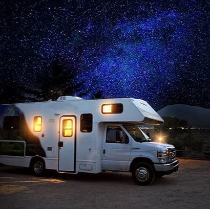 RV under starry night sky