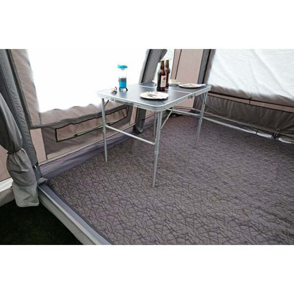 Insulated Carpet-Kela 2.20 x 3.0m RVF4520 used with a folding table inside a tent setup.