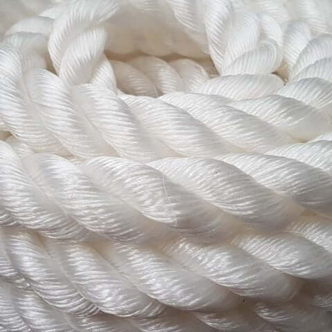 Silver Rope 3 strand 12mm x 250M Coil, featuring strong and durable twisted white fibers.