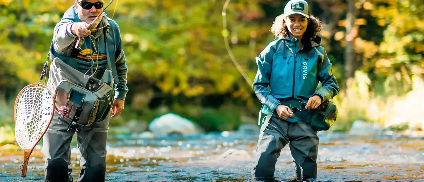 Game Changing Coolest Fishing Gear Picks for 2026 - Two anglers fishing together in a serene river environment.
