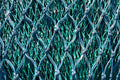 500gram Spool 1.5mm White Nylon Flat Braid detailed view of knots and braids in green tone.