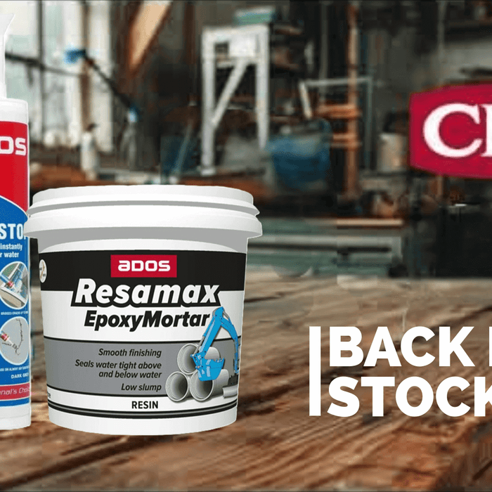 CRC products for industrial use displayed on a workshop table with various items in stock.