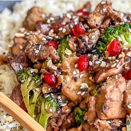 Sesame chicken with pomegranate and ginger rice