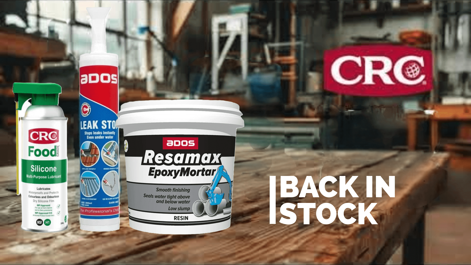 CRC products for industrial use displayed on a workshop table with various items in stock.