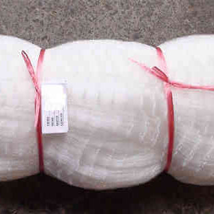 3 Inch Pacific Island Mesh for Sustainable Fishing Practices rolled and tied with ribbon.