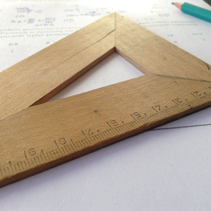 brown wooden triangle ruler