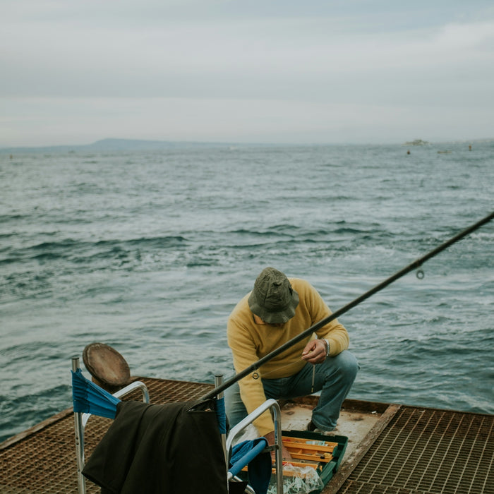man near body of water at daytime