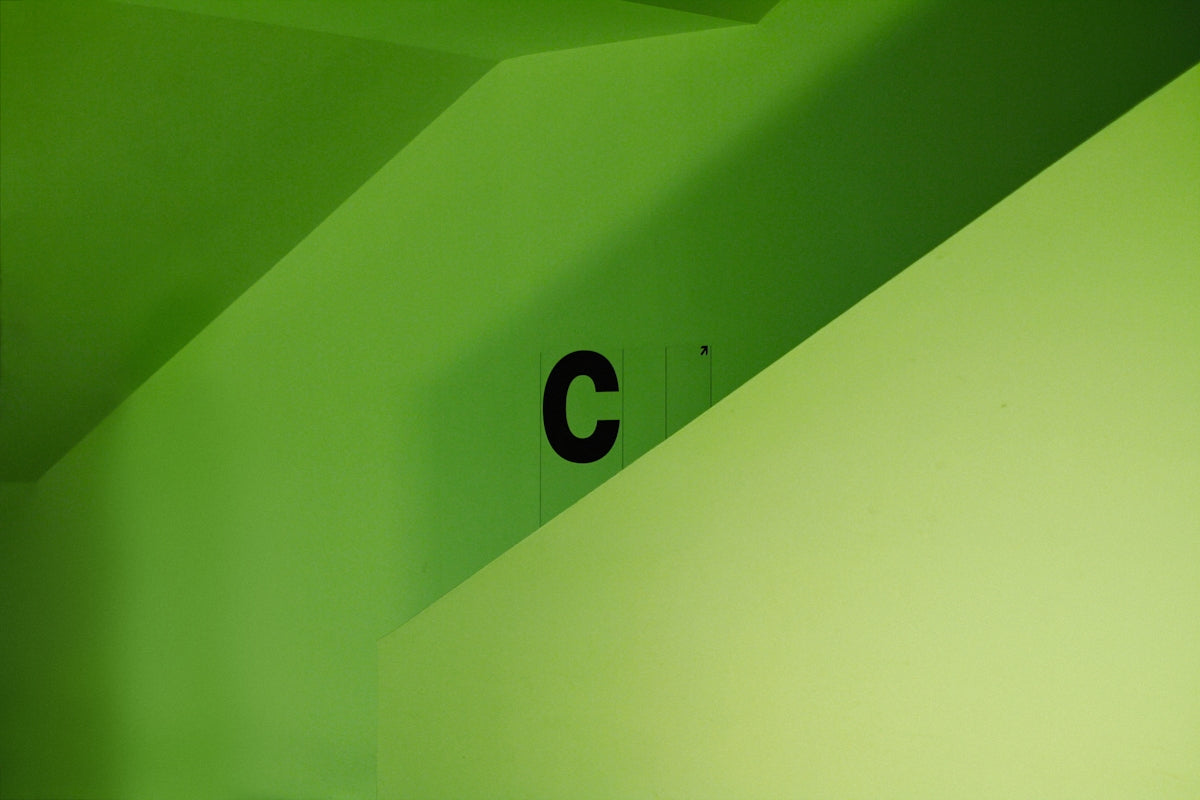 Exploring the Benefits of CRC Products on a green wall with a large letter C.