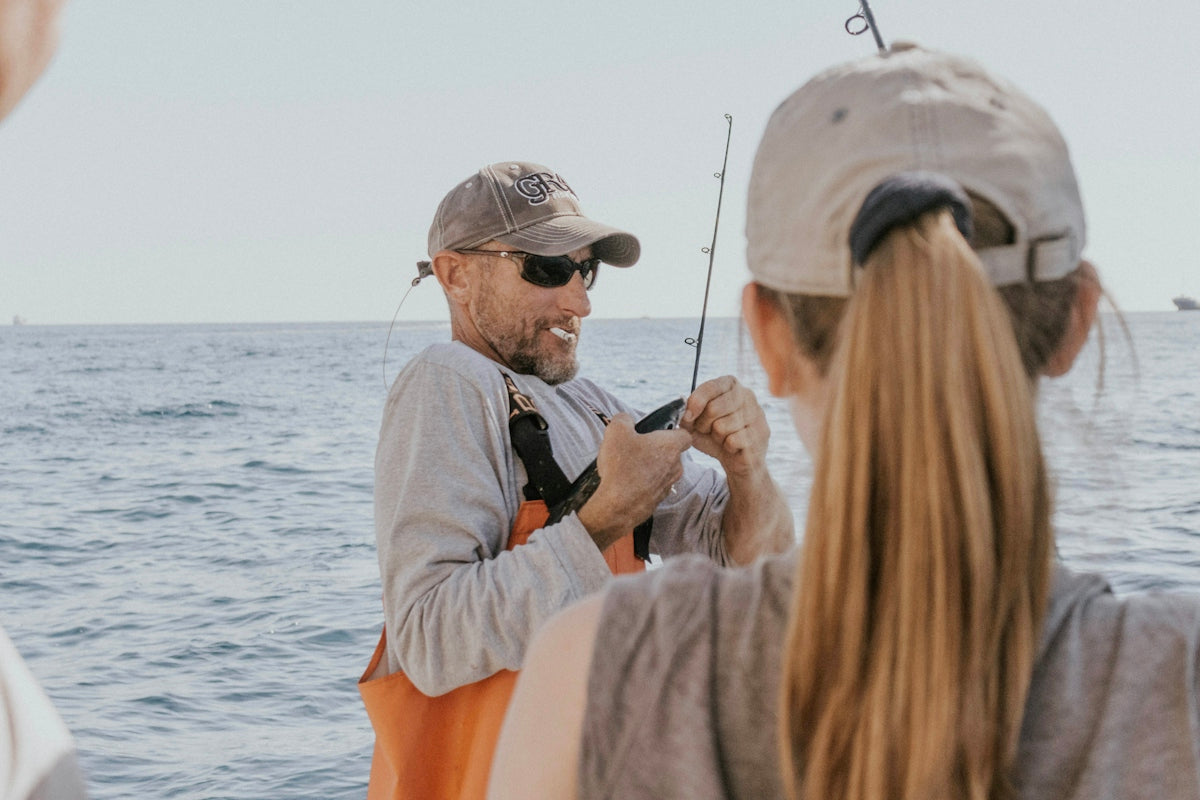 man holding fishing rod