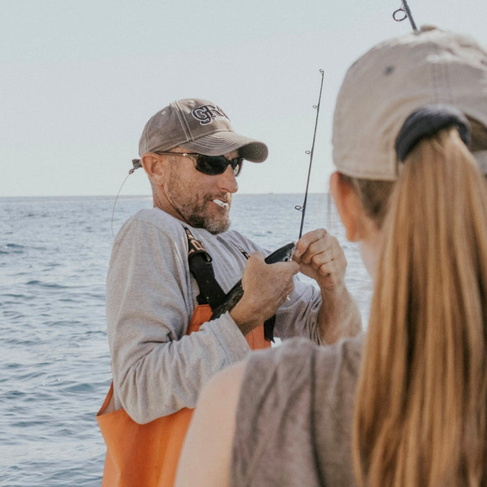 man holding fishing rod