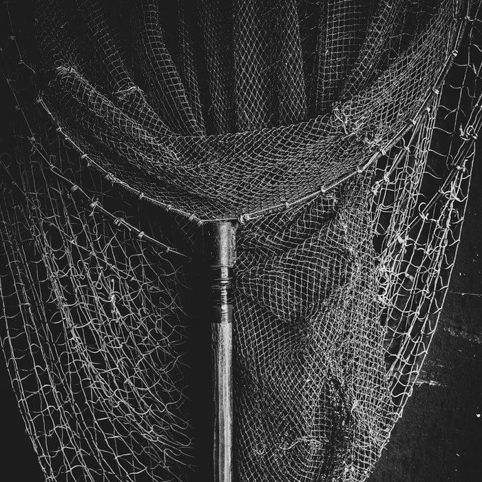 black and white photo of a net