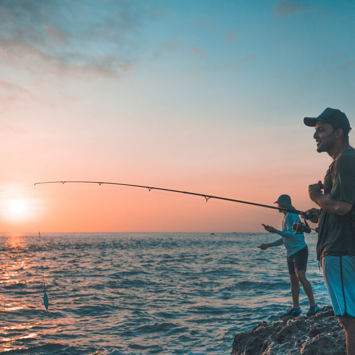 a man and a woman fishing
