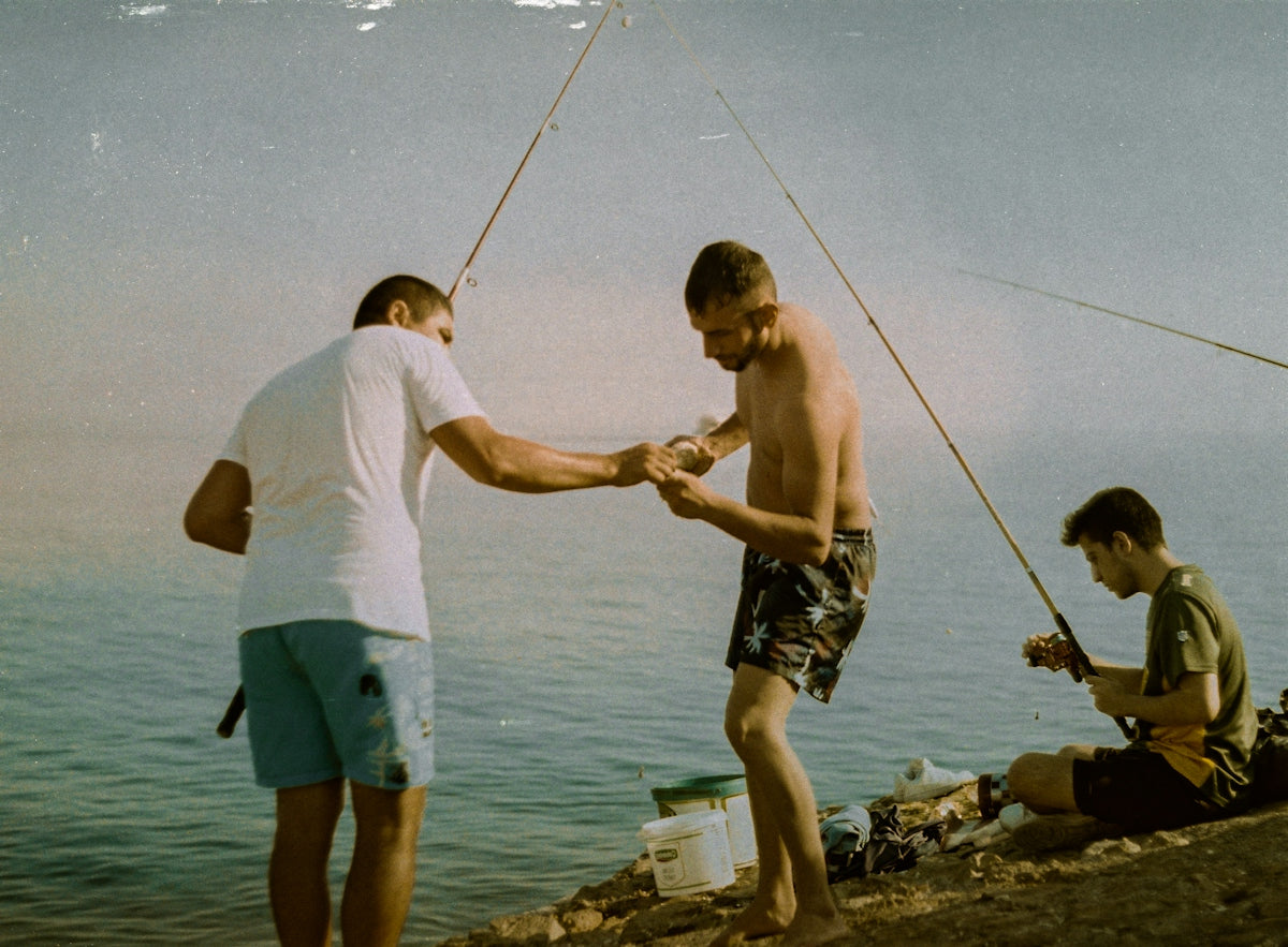 a group of men fishing