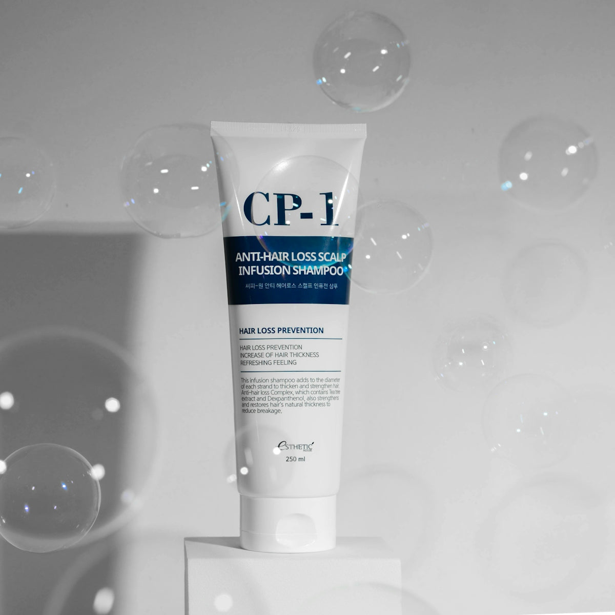 a tube of cream sitting on top of a box