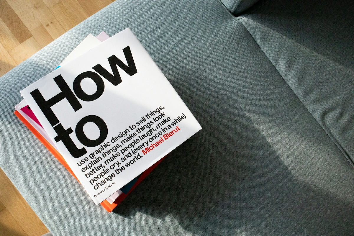 a close up of a book on a couch