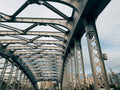 A view of a bridge from the ground