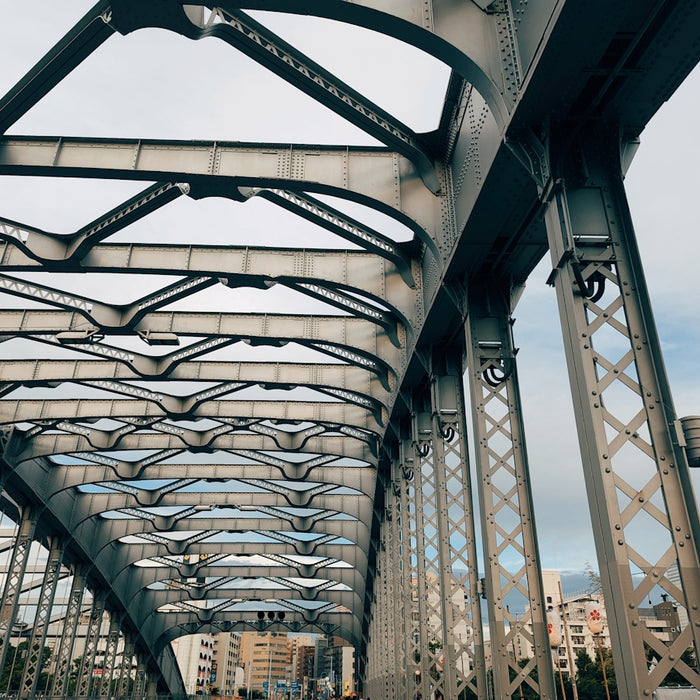 A view of a bridge from the ground