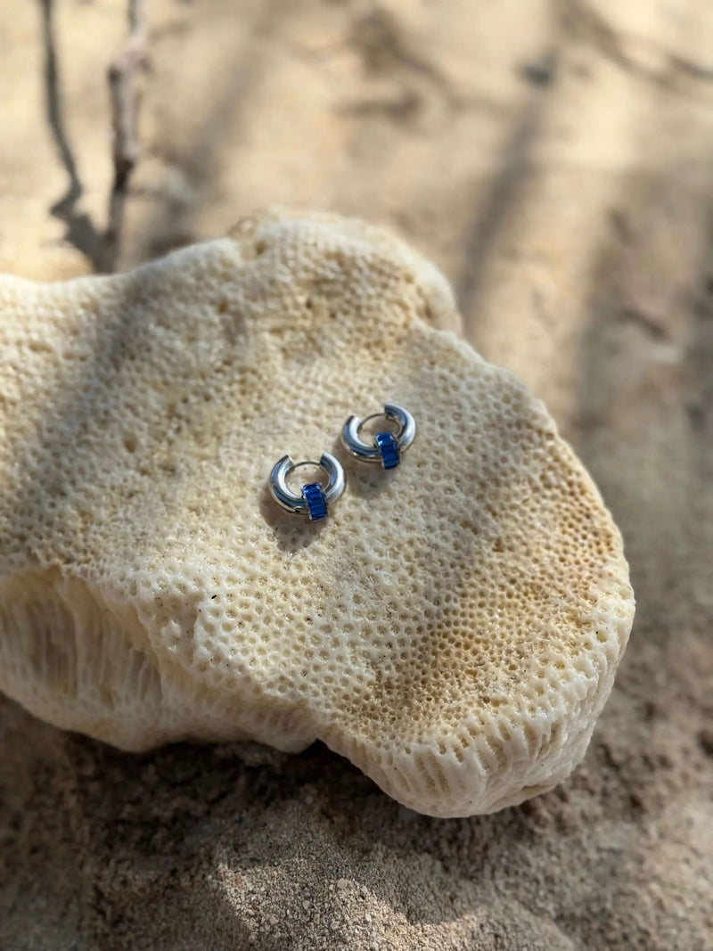 Moana Pūkākā Silver Huggies by Tahana Jewellery