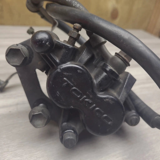 GSF250V Front brake caliper and line by Motor Morgue