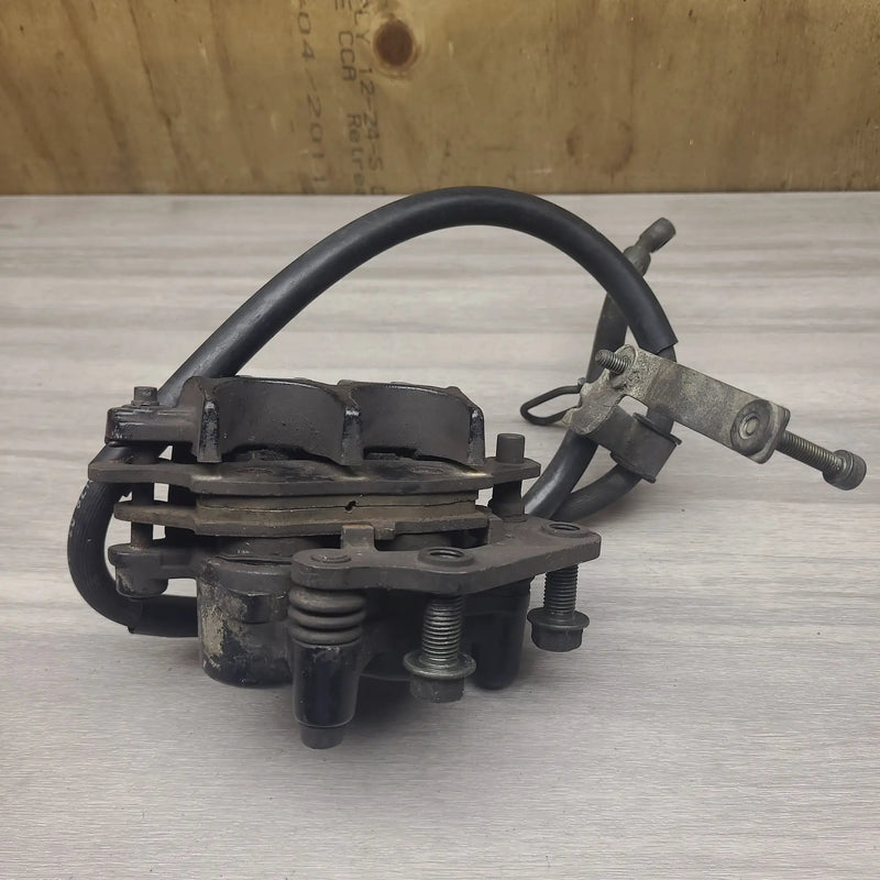 GSF250V Front brake caliper and line by Motor Morgue