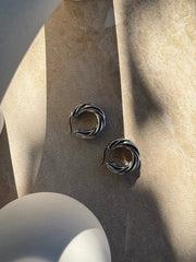 Tāwhirowhiro Silver Earrings by Tahana Jewellery