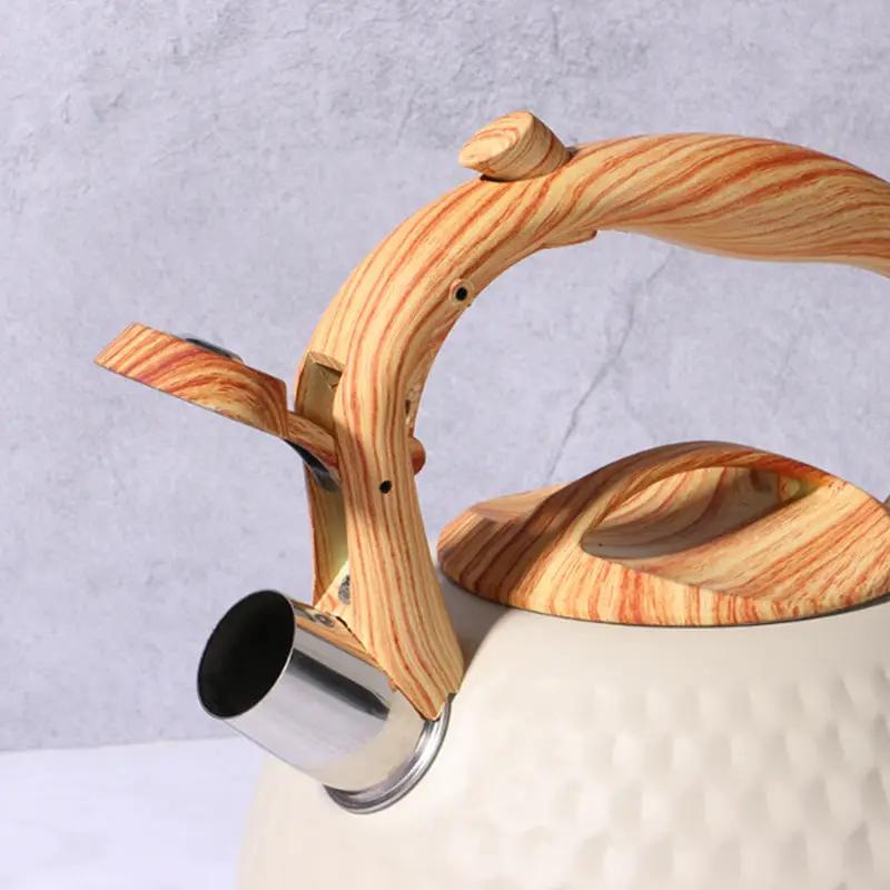 g8buynz g8buynz Whistling 304 Stainless Steel Diamond Pattern Tea Kettle with Wood Grain Handle Whistling 304 Stainless Steel Diamond Pattern Tea Kettle with Wood Grain Handle
