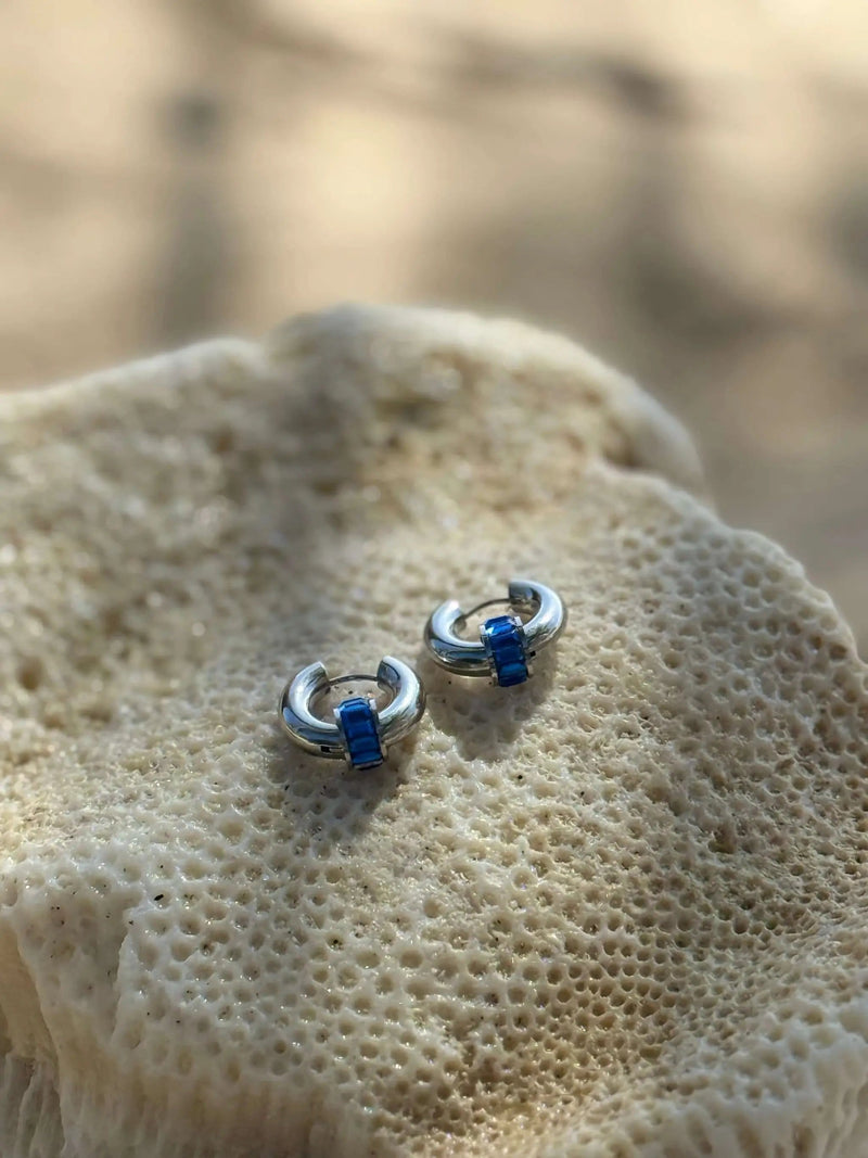 Moana Pūkākā Silver Huggies by Tahana Jewellery