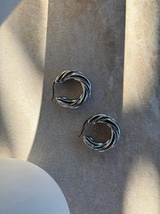 Tāwhirowhiro Silver Earrings by Tahana Jewellery