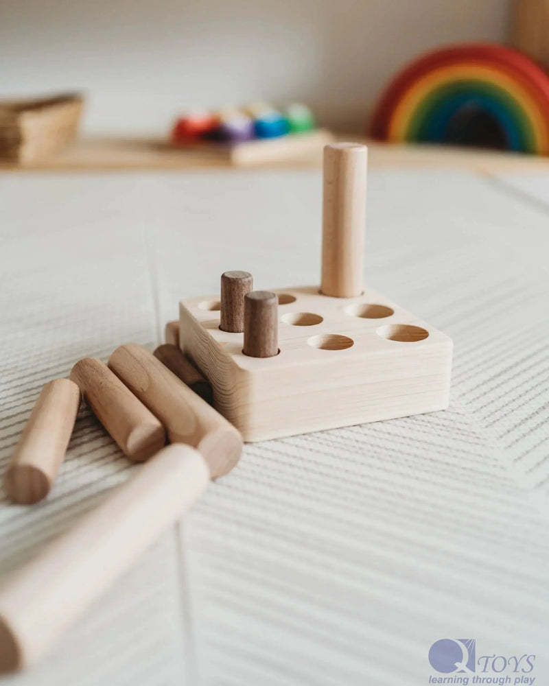 Wooden 9 Pole Puzzle - QToys | Wooden Toy NZ by Curious Moonbeam