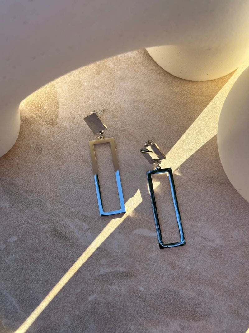 Tāhūroa Silver Earrings by Tahana Jewellery