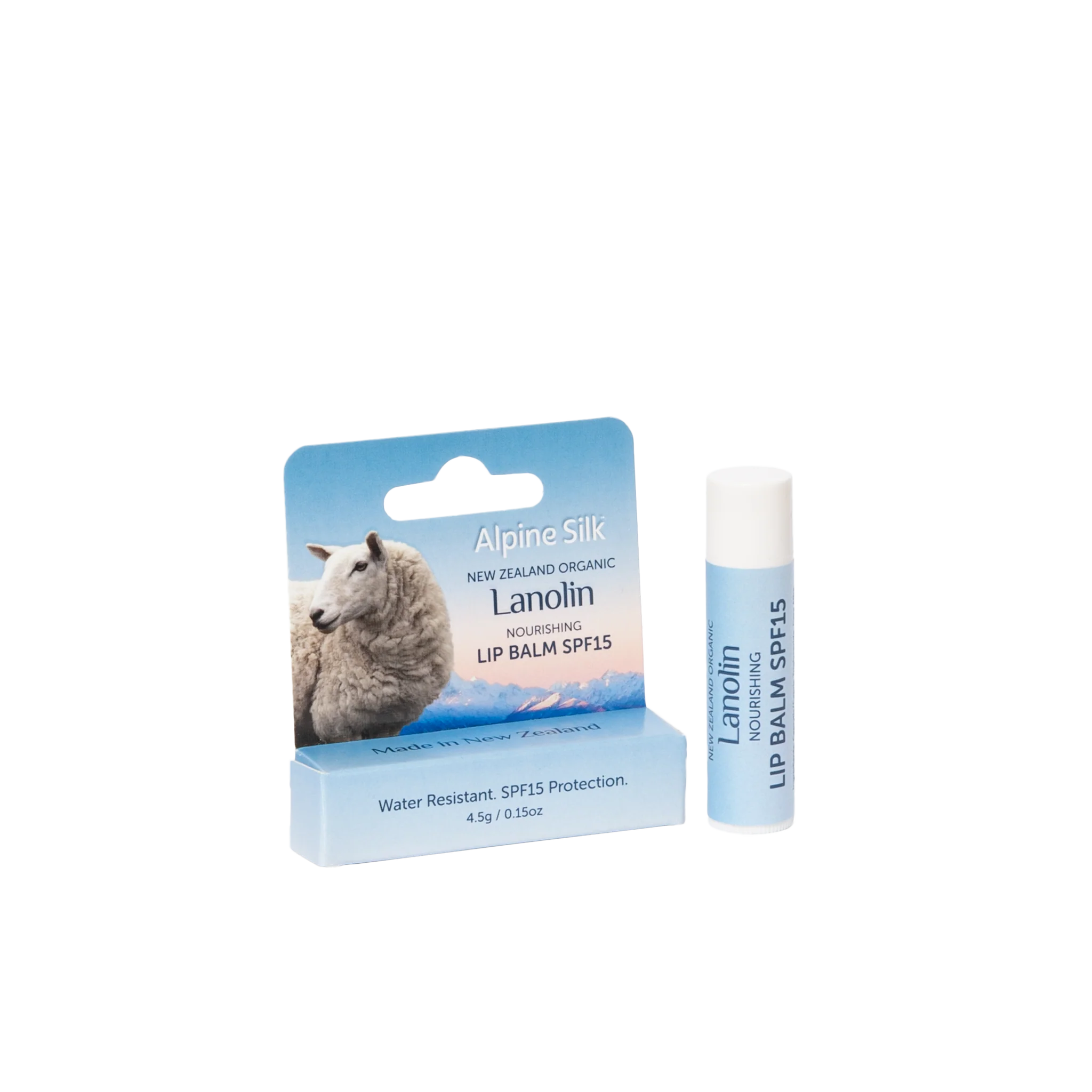 Alpine Silk Organic Lanolin SPF15 Lip Balm 4.5g with packaging and sheep background, promotes lip protection and nourishment.