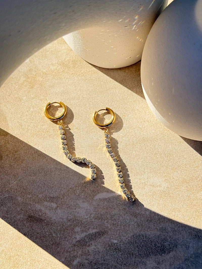 Māhina Roa Gold Huggies by Tahana Jewellery