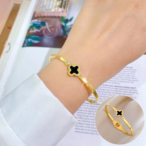 Poppy Gifts Jewellery Midnight Clover Gold Bangle Bracelet Midnight Clover Gold Bangle Bracelet