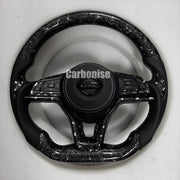 Nissan Steering Wheel (Forged Carbon Fiber+Perforated Leather) by CARBONISE