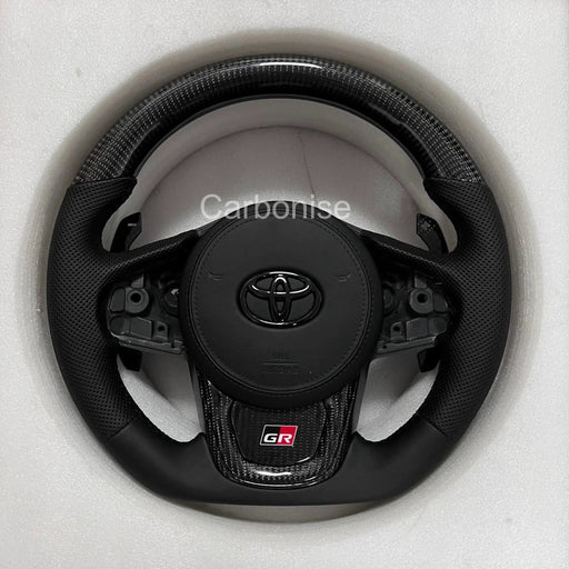 Supra Steering Wheel(Carbon Fiber+Perforated Leather)#09 by CARBONISE