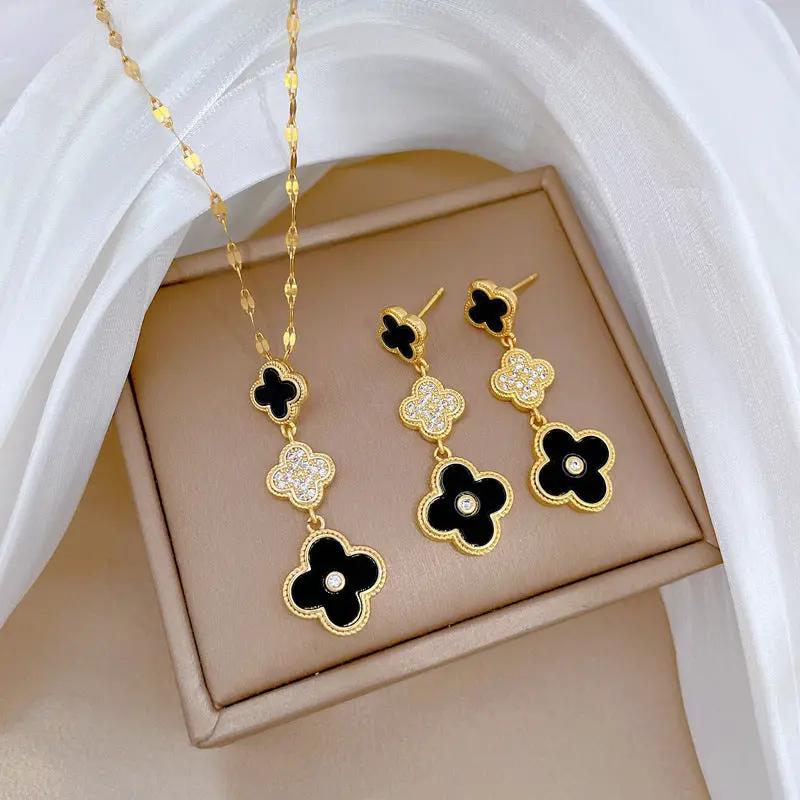 Midnight Clover Gold Necklace & Earrings Set by Poppy Gifts