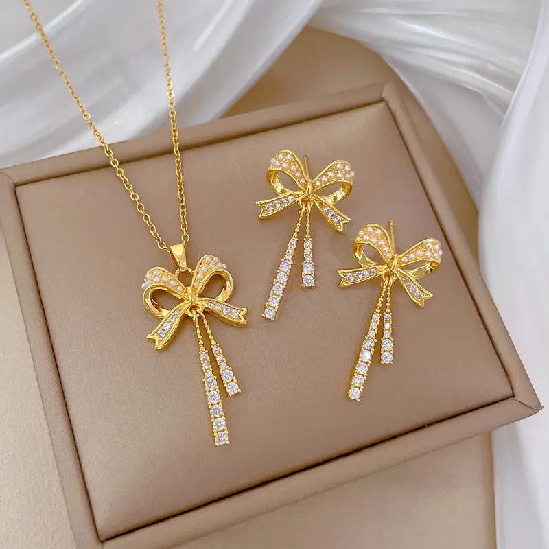 Celeste Bow Gold Necklace & Earrings Set by Poppy Gifts