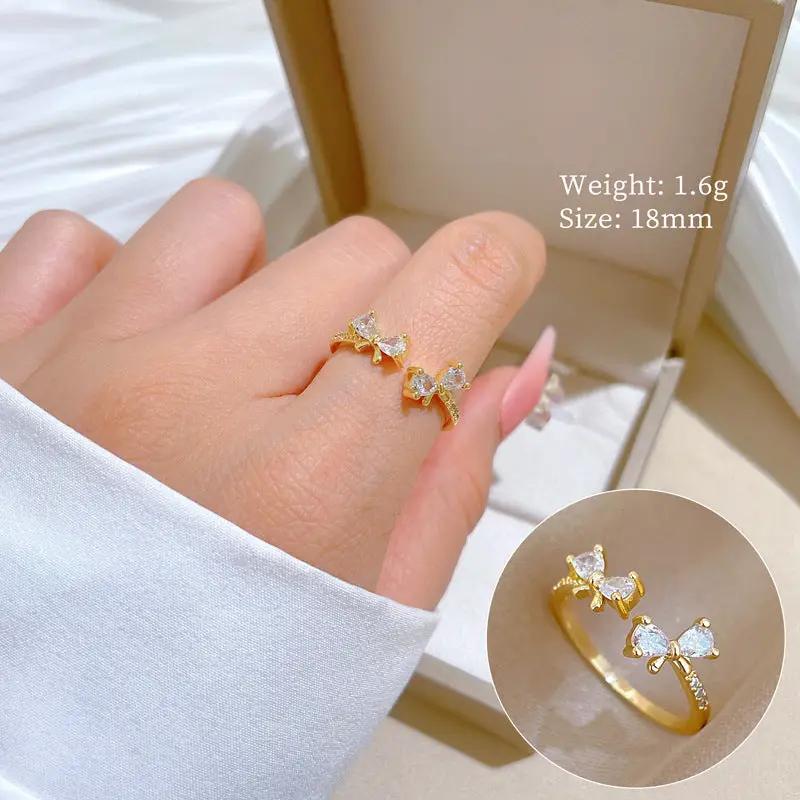 Celestia Bow Gold Crystal Adjustable Ring by Poppy Gifts