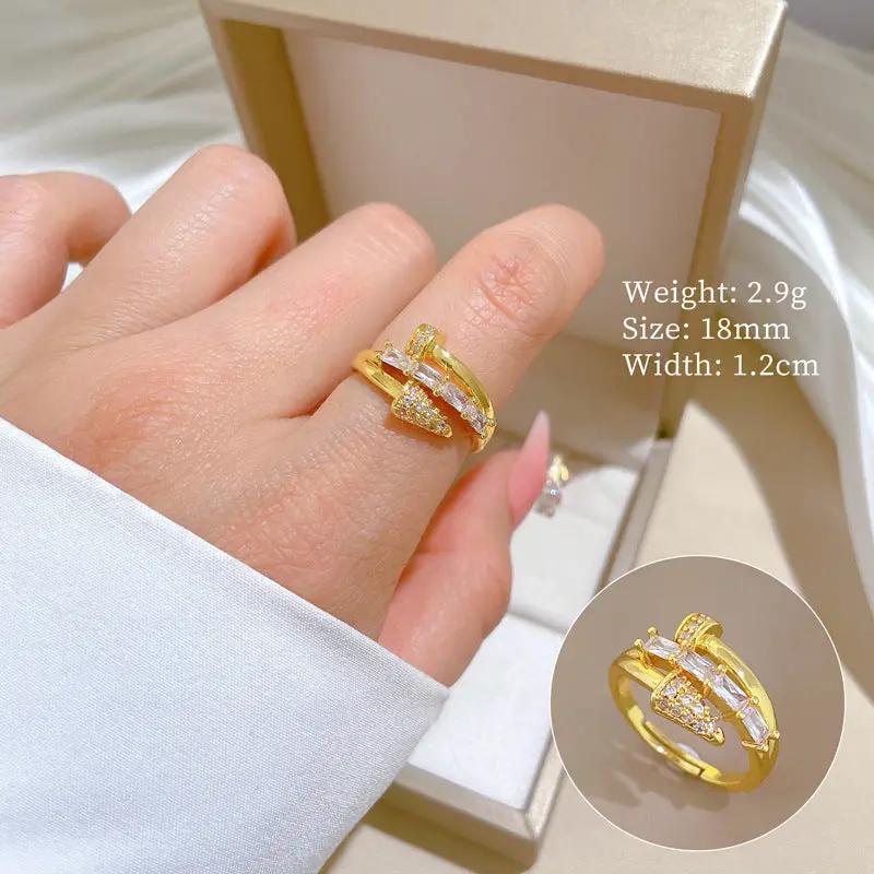 Celestia Arrow Gold Crystal Crossover Adjustable Ring by Poppy Gifts