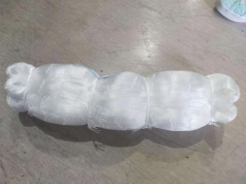 Extra Deep Mesh 0.35mm x 4-00" x 100md x 100m bundle on a work surface.