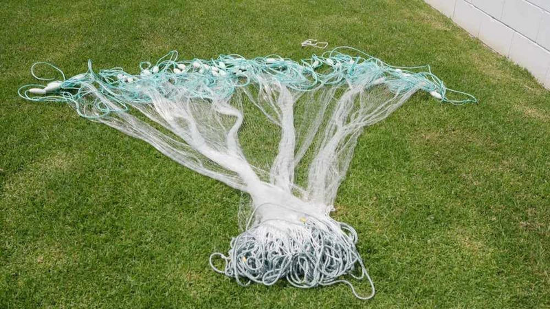Herring Bait Fishing Nets 2inch, 2.25" 2.5" & 3-00 Inch displayed on grass.